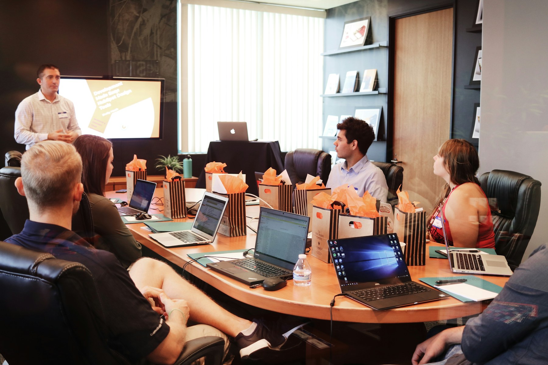 Corporate team in a boardroom discussing energy trading strategy